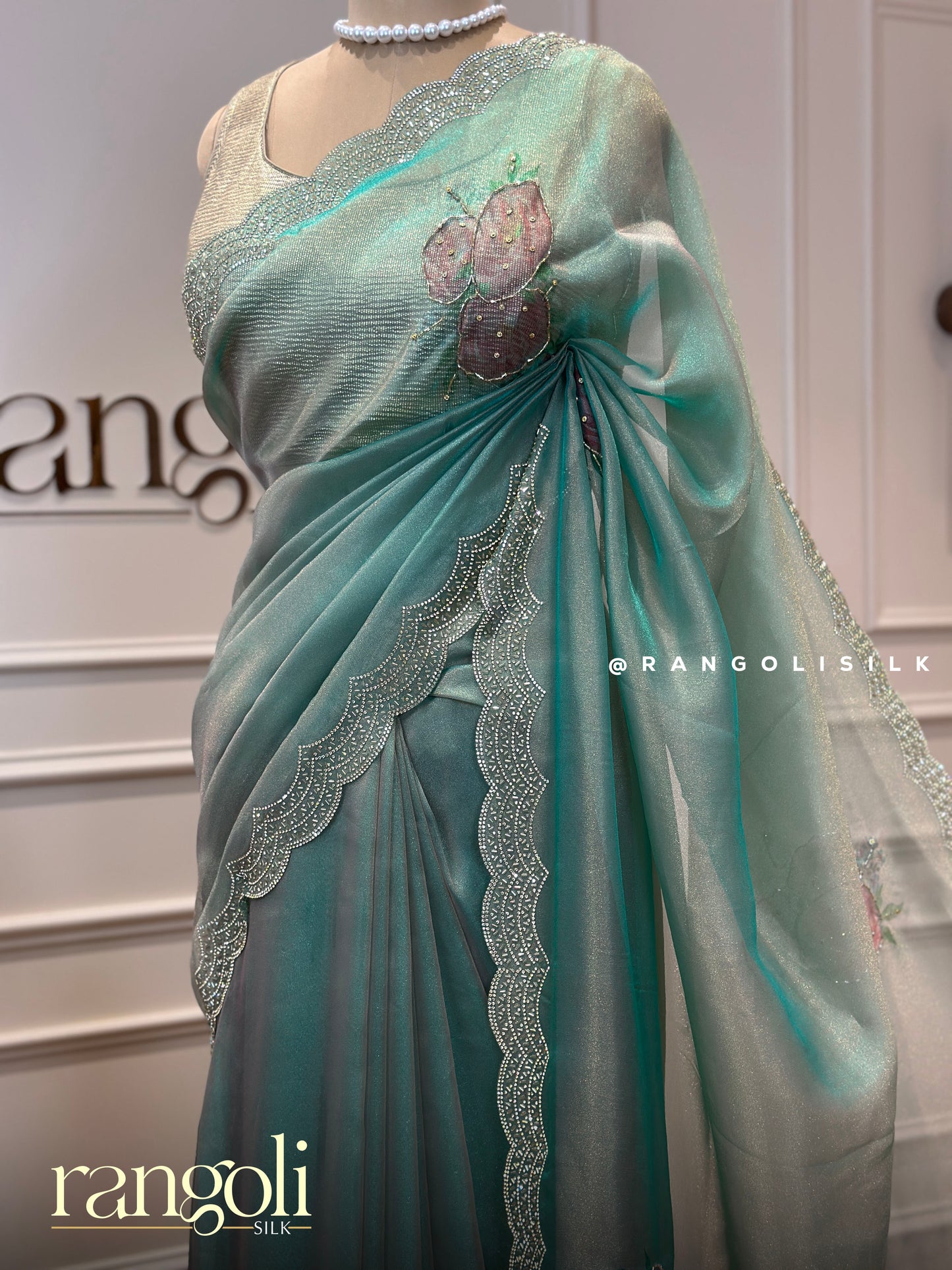 Pastel Organza Saree with Embellished Florals and Rich Border - Post 393