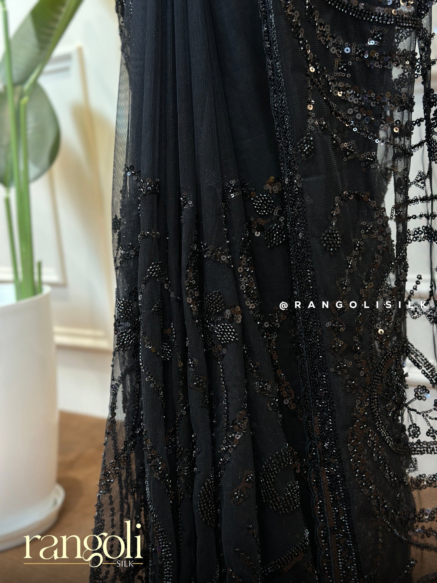 Designer Black Net Saree with Subtle Pattern Work - Post 698