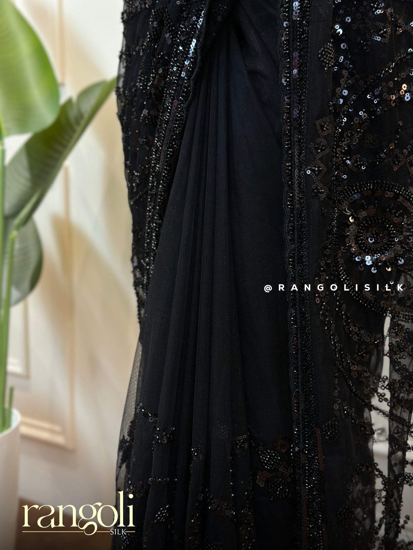 Designer Black Net Saree with Subtle Pattern Work - Post 698