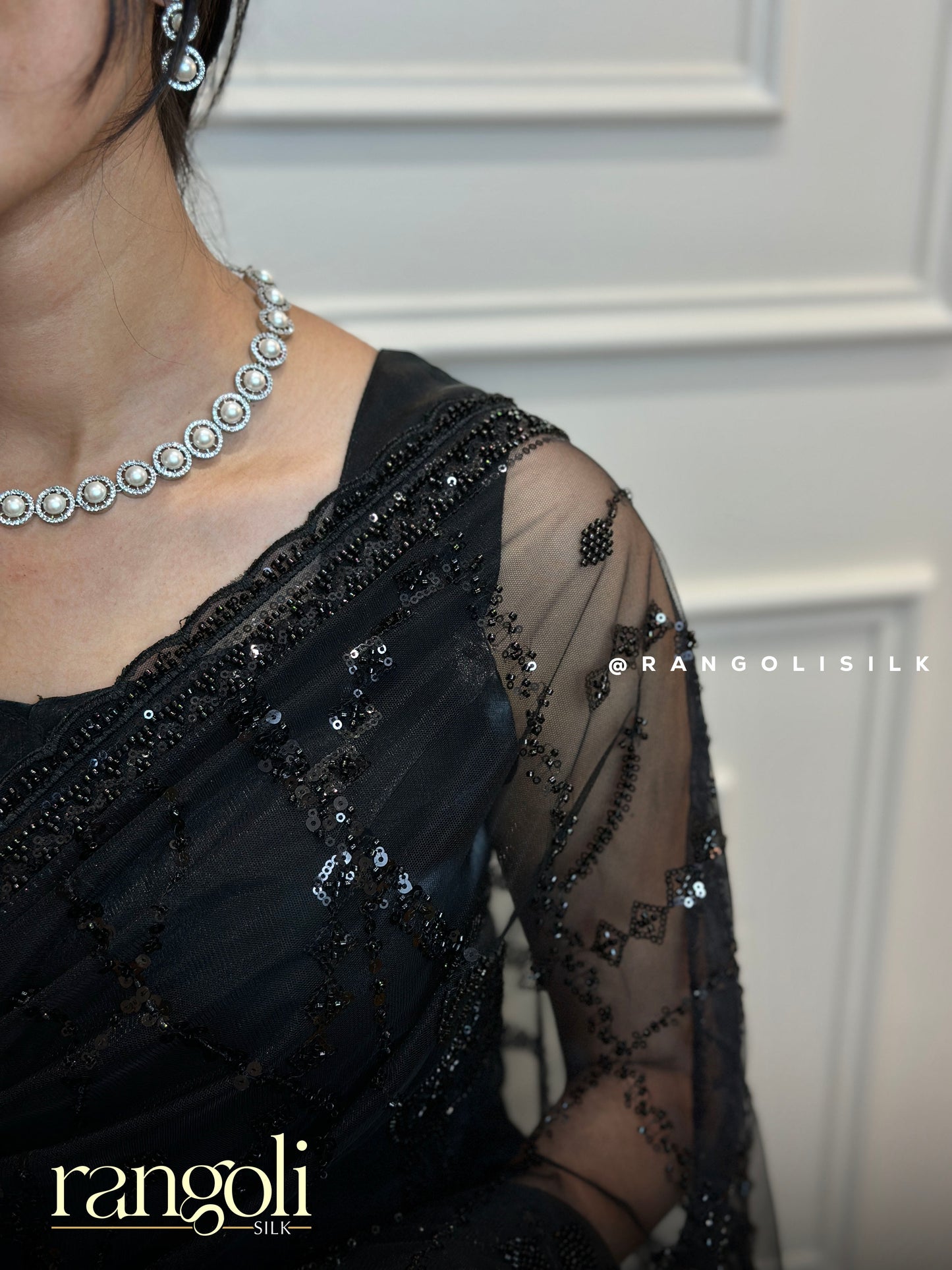 Designer Black Net Saree with Subtle Pattern Work - Post 698