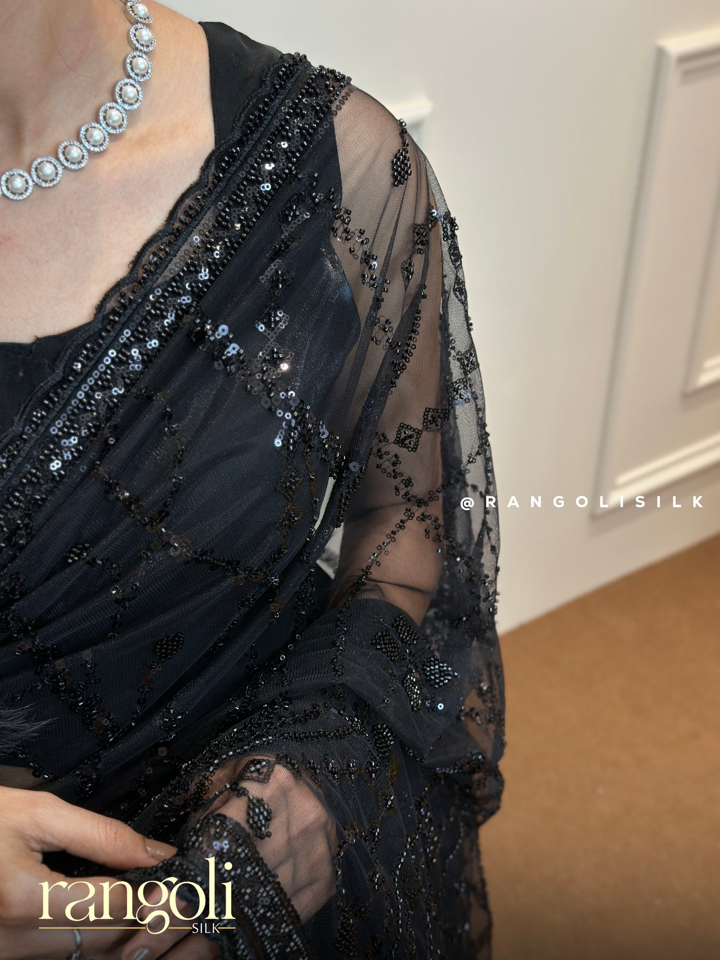 Designer Black Net Saree with Subtle Pattern Work - Post 698