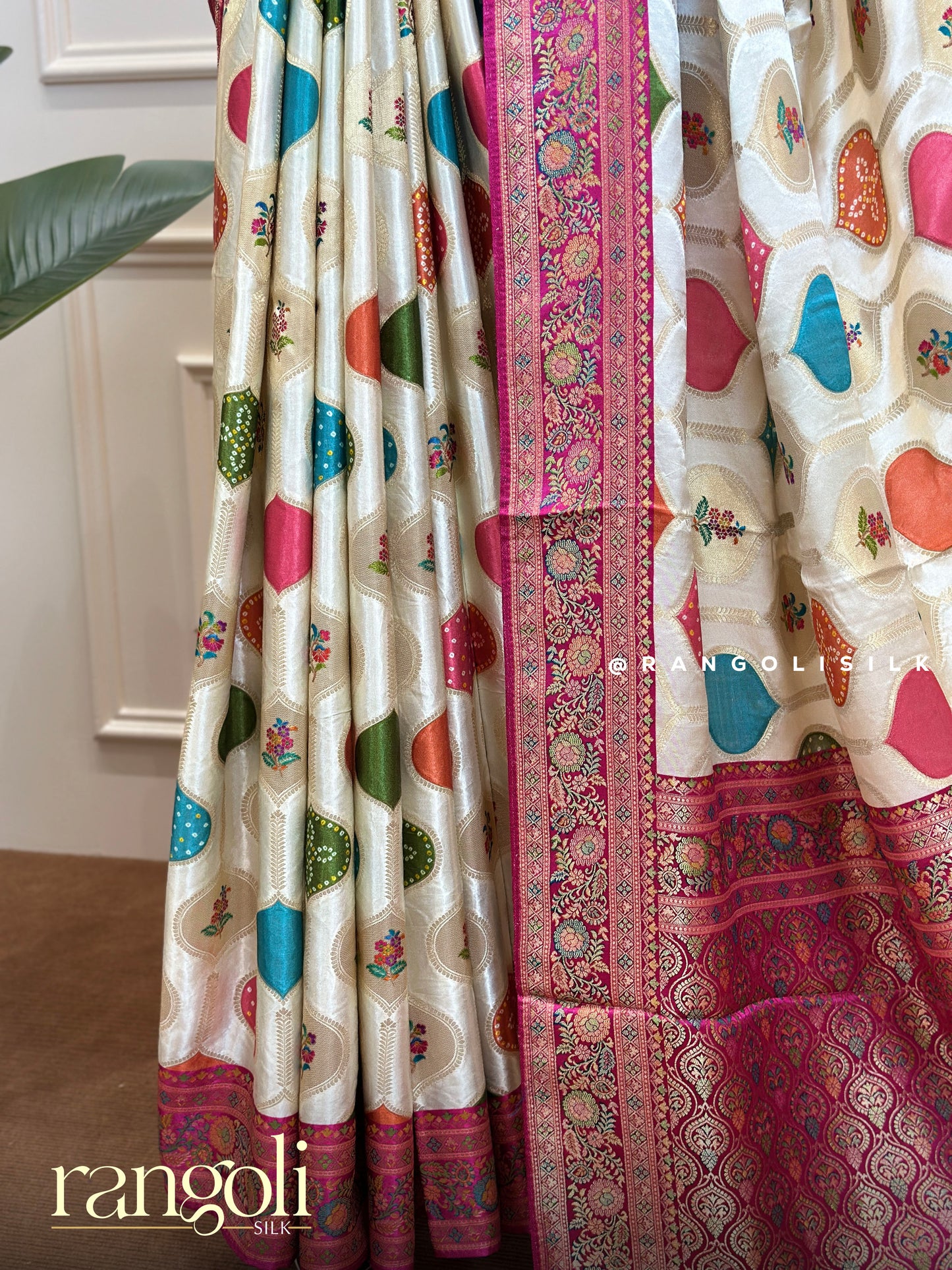 Elegant Ivory Saree with Colourful Motifs and Pink Detailed Border - Post 632